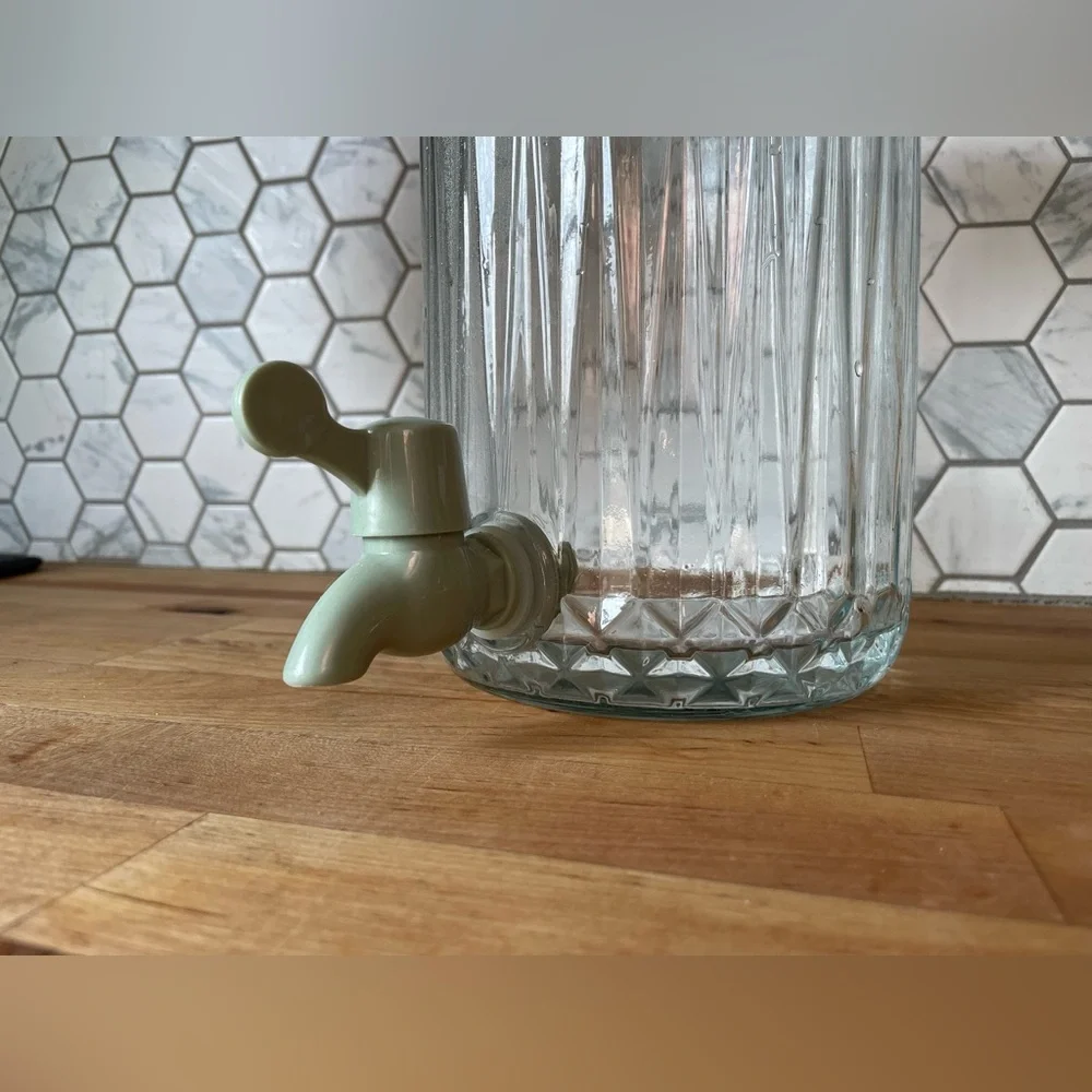 IKEA Clear Glass Beverage Dispenser with Green Lid and Spout